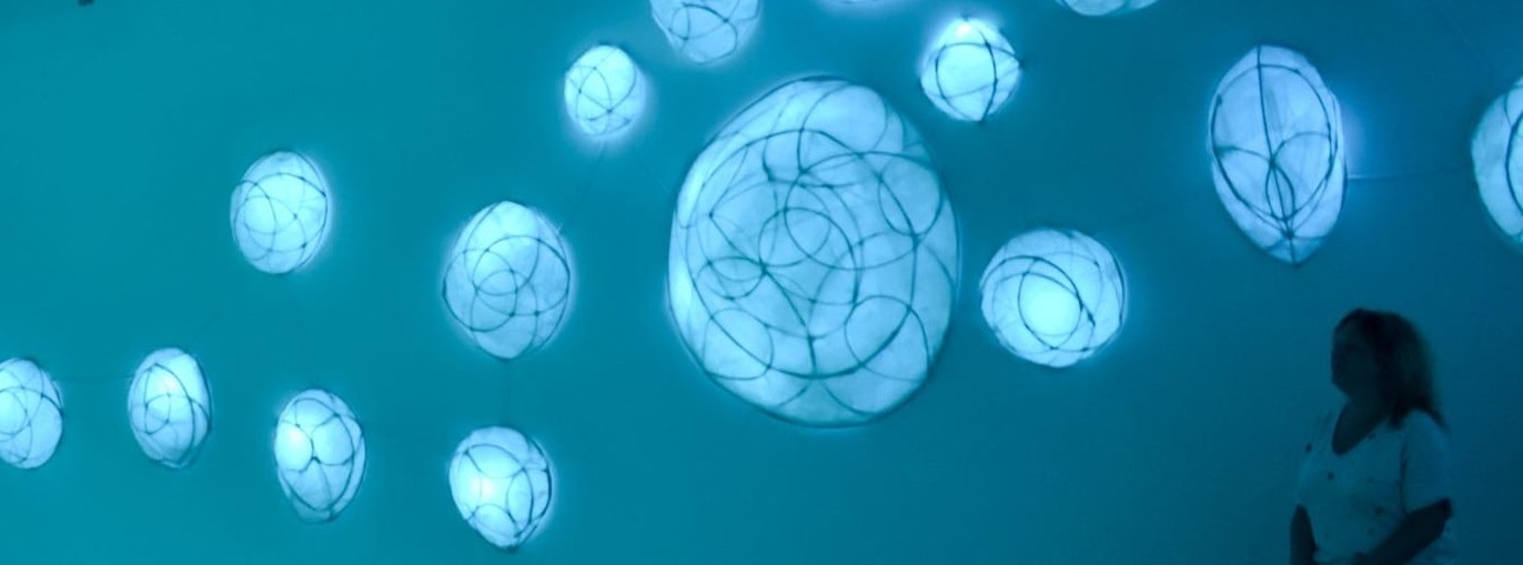 photo of women enjoying the exhibition