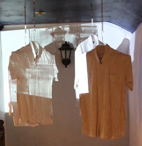 Shirts hanging on a projector